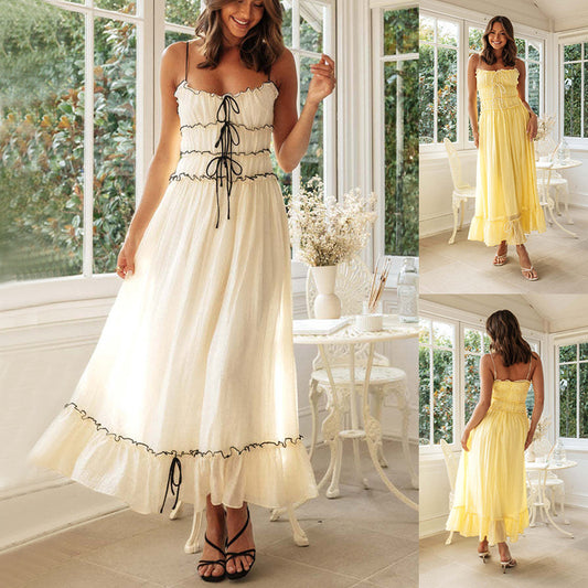 Robe longue  bretelles spaghetti avec nœud plissé